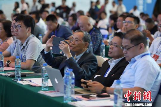 研討會現(xiàn)場圖?！■暮陚?攝