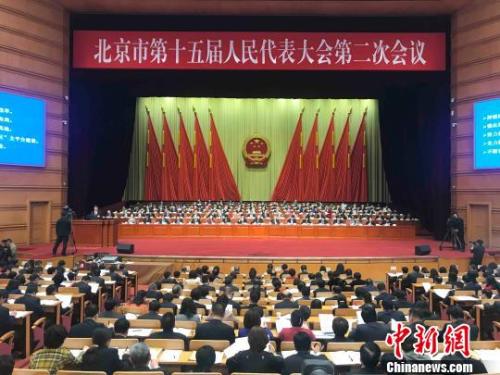 北京市十五屆人大二次會議14日開幕。北京市長陳吉寧向大會作政府工作報告?！∫?攝